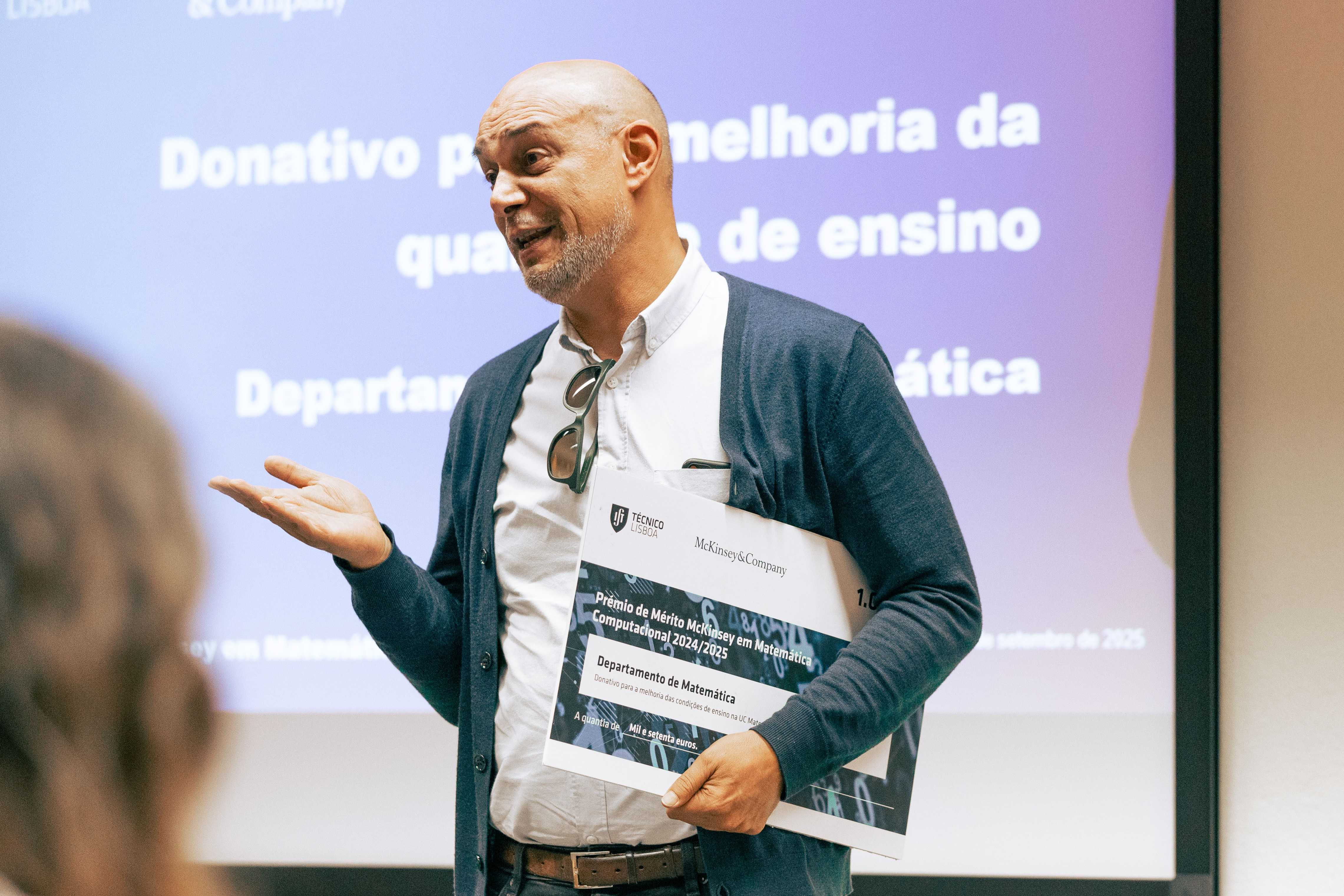Speaker presenting at McKinsey & Técnico Lisboa event
