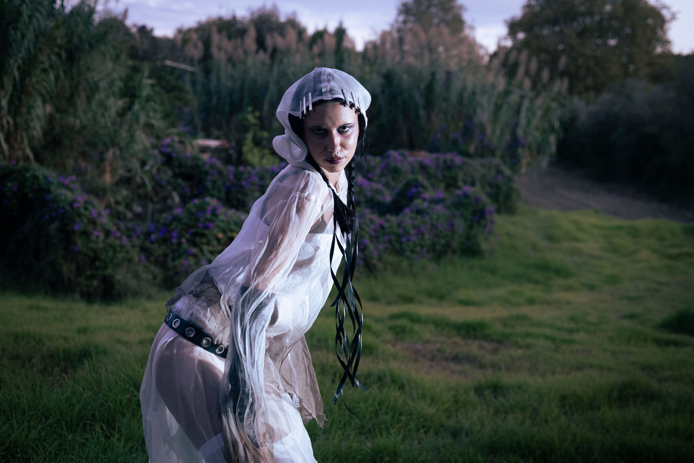 Fashion Editorial - Sheer white gown in garden